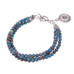 Jasper beaded charm bracelet, 'Three Graces' - Om Symbol Beaded Bracelet with Blue and Brown Jasper