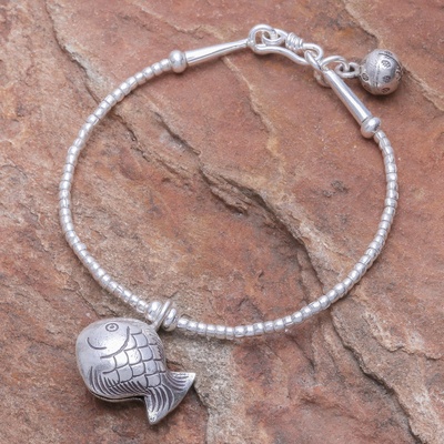 Silver beaded charm bracelet, 'Singing Hill Tribe Goldfish' - Karen Hill Tribe Silver Goldfish Bracelet with Ringing Bells