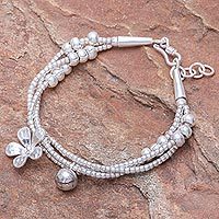 Silver beaded charm bracelet, 'Singing Blossom' - Thai Karen Hill Tribe Silver Floral Bracelet with a Bell