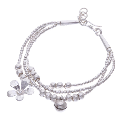 Silver beaded charm bracelet, 'Singing Blossom' - Thai Karen Hill Tribe Silver Floral Bracelet with a Bell