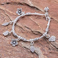 Silver beaded charm bracelet, 'Essence of the Forest' - Floral Karen Silver Beaded Charm Bracelet from Thailand