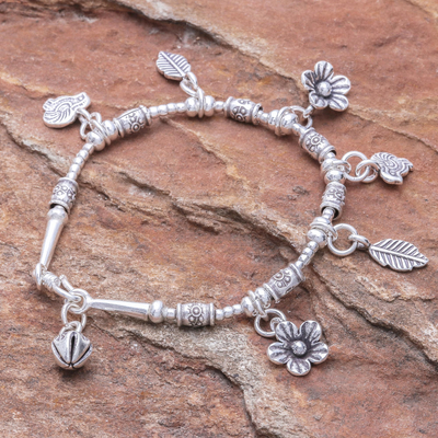 Silver beaded charm bracelet, 'Essence of the Forest' - Floral Karen Silver Beaded Charm Bracelet from Thailand