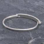 Sterling silver bangle bracelet, 'Pachyderm Parade' - Thai Elephant Sterling Silver Bangle Bracelet
