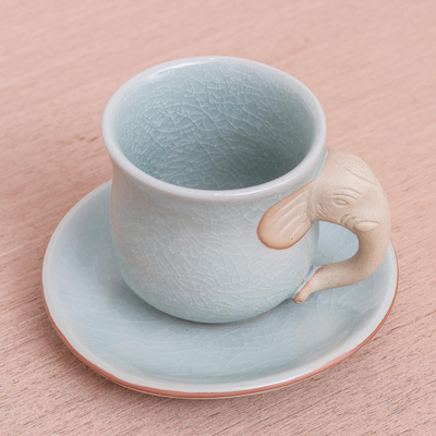Celadon ceramic cup and saucer, 'Elephant Gaze' - Aqua Celadon Cup and Saucer with Elephant Motif