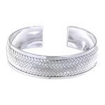 Sterling silver cuff bracelet, 'Weaving Tales' - Sterling Silver Cuff Bracelet with Woven Motif