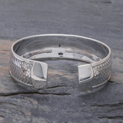 Sterling silver cuff bracelet, 'Weaving Tales' - Sterling Silver Cuff Bracelet with Woven Motif