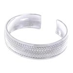 Sterling silver cuff bracelet, 'Weaving Tales' - Sterling Silver Cuff Bracelet with Woven Motif