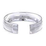 Sterling silver cuff bracelet, 'Weaving Tales' - Sterling Silver Cuff Bracelet with Woven Motif