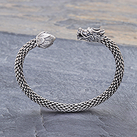 Sterling silver cuff bracelet, 'Dragon and Lotus' - Unisex Sterling Silver Cuff with Dragon and Lotus