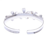 Sterling silver cuff bracelet, 'Blossom Row' - Hammered Sterling Silver Flower Cuff Bracelet