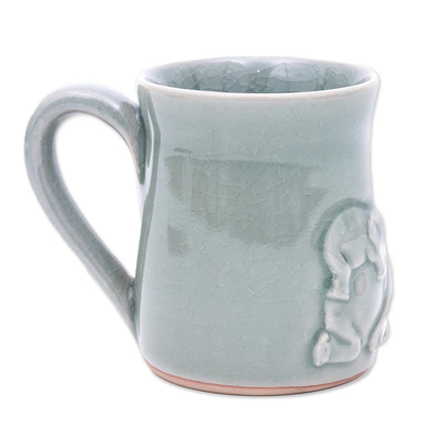 Celadon ceramic mug, 'Elephant Play' - Elephant Motif Celadon Ceramic Mug from Thailand