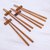 Teak wood chopsticks set, 'Smooth Meal' (set of 4) - Teak Chopstick Set of 4 with Rests (image 2) thumbail
