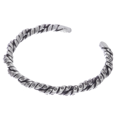 Sterling silver cuff bracelet, 'With a Twist' - Floral Stamped Twisted Sterling Silver Cuff Bracelet