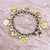 Calcite and brass beaded charm bracelet, 'Elephant Farm' - Blue Calcite and Brass Elephant Charm Bracelet