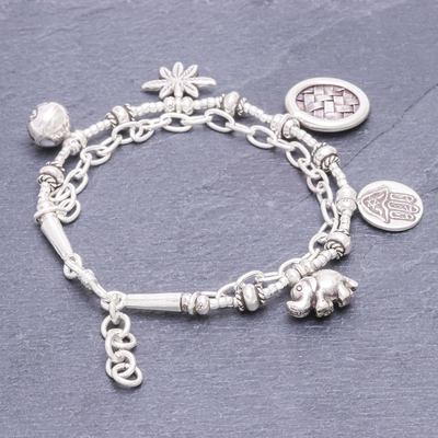 Sterling silver charm bracelet, 'Ethnic Charm' - Hand Crafted Sterling Silver Charm Bracelet
