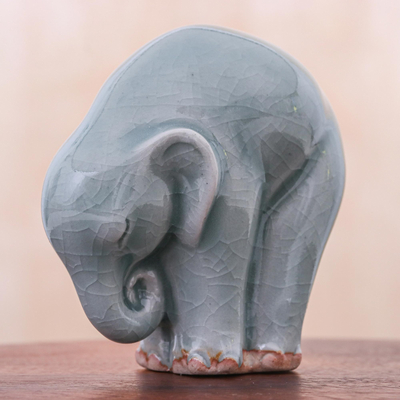Celadon ceramic figurine, 'Elephant Forward Bend' - Ceramic Elephant Yoga-Themed Figurine from Thailand