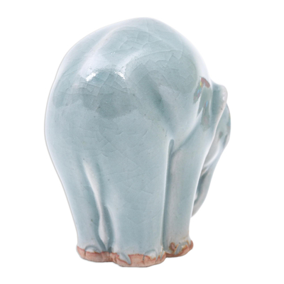 Celadon ceramic figurine, 'Elephant Forward Bend' - Ceramic Elephant Yoga-Themed Figurine from Thailand