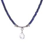 Quartz and lapis lazuli pendant necklace, 'Wild Moon' - Handmade Clear Quartz and Lapis Lazuli Pendant Necklace