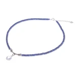 Quartz and lapis lazuli pendant necklace, 'Wild Moon' - Handmade Clear Quartz and Lapis Lazuli Pendant Necklace