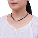 Quartz and lapis lazuli pendant necklace, 'Wild Moon' - Handmade Clear Quartz and Lapis Lazuli Pendant Necklace