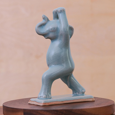 Celadon ceramic figurine, 'Elephant Warrior Pose' - Hand Made Celadon Ceramic Elephant Yoga-Themed Figurine