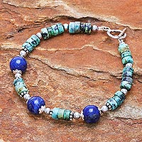 Lapis lazuli and hematite beaded pendant bracelet, 'Earth Orbit'