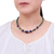 Lapis lazuli and hematite pendant necklace, 'Earth Orbit' - Handmade Lapis Lazuli and Hematite Pendant Necklace