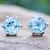 Blue topaz stud earrings, 'Catch a Star in Light Blue' - Artisan Crafted Blue Topaz and Sterling Silver Stud Earrings thumbail