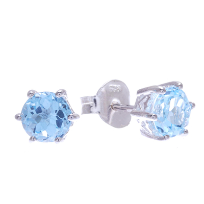 Blue topaz stud earrings, 'Catch a Star in Light Blue' - Artisan Crafted Blue Topaz and Sterling Silver Stud Earrings