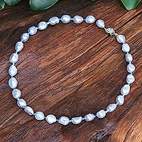 Cultured pearl and lapis lazuli beaded necklace, 'Sea Journey in Blue' - Cultured Freshwater Pearl and Lapis Lazuli Beaded Necklace