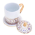Benjarong porcelain cup and saucer, 'Royal Drink' - Hand Painted Porcelain Cup and Saucer Set