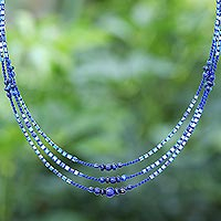 Macrame lapis lazuli and howlite beaded necklace, 'Sea Plane' - Macrame Lapis Lazuli and Howlite Beaded Necklace