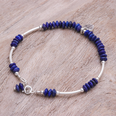 Lapis lazuli charm bracelet, 'Stillness in Blue' - Lapis Lazuli Sterling Silver Leaf Charm Bracelet