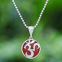 Carnelian pendant necklace, 'The Spirit in Orange' - Carnelian and Sterling Silver Om Necklace