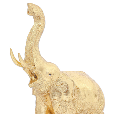 Escultura de lámina de oro y madera. - Escultura de elefante de madera y lámina de oro tailandesa.