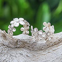 Sterling silver ear cuffs, 'Silver Daisy' - Handcrafted Sterling Silver Floral Ear Cuffs