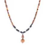 Multi-gemstone pendant necklace, 'Basking Beauty' - Handmade Tiger's Eye and Onyx Pendant Necklace