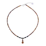 Multi-gemstone pendant necklace, 'Basking Beauty' - Handmade Tiger's Eye and Onyx Pendant Necklace