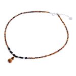 Multi-gemstone pendant necklace, 'Basking Beauty' - Handmade Tiger's Eye and Onyx Pendant Necklace