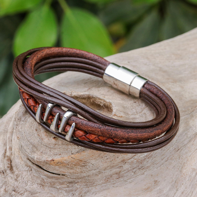 Leather pendant bracelet, 'Fanged in Brown' - Handmade Braided Leather Pendant Bracelet