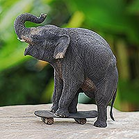 Teak wood sculpture, Elephant Wheelie
