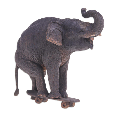 Teak wood sculpture, 'Elephant Wheelie' - Hand Crafted Teak Wood Elephant Sculpture