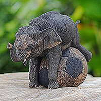 Teak wood sculpture, Elephant Soccer