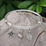 Silver charm bracelet, 'Garden Sounds' - Sterling Silver Garden-Motif Charm Bracelet