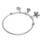 Silver charm bracelet, 'Garden Sounds' - Sterling Silver Garden-Motif Charm Bracelet