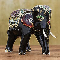 Gold-accented wood sculpture, Elephant Show