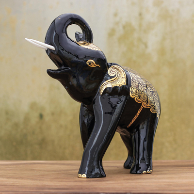 Gold-accented wood sculpture, 'Elephant King' - Gold-Accented Raintree Wood Sculpture from Thailand