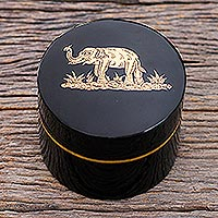 Gold-accented lacquerware wood box, 'Elephant Play' - Round Lacquerware Box with Elephant Motif