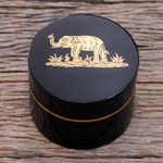Gold-accented lacquerware wood box, 'Elephant Play' - Round Lacquerware Box with Elephant Motif