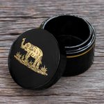 Gold-accented lacquerware wood box, 'Elephant Play' - Round Lacquerware Box with Elephant Motif